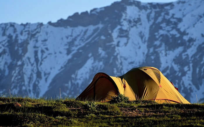 A yellow camp in the mountains 