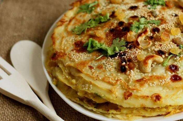 have Chatti Pathiri in Kerala, sweet cakes made out of crepe pancakes and dry fruits