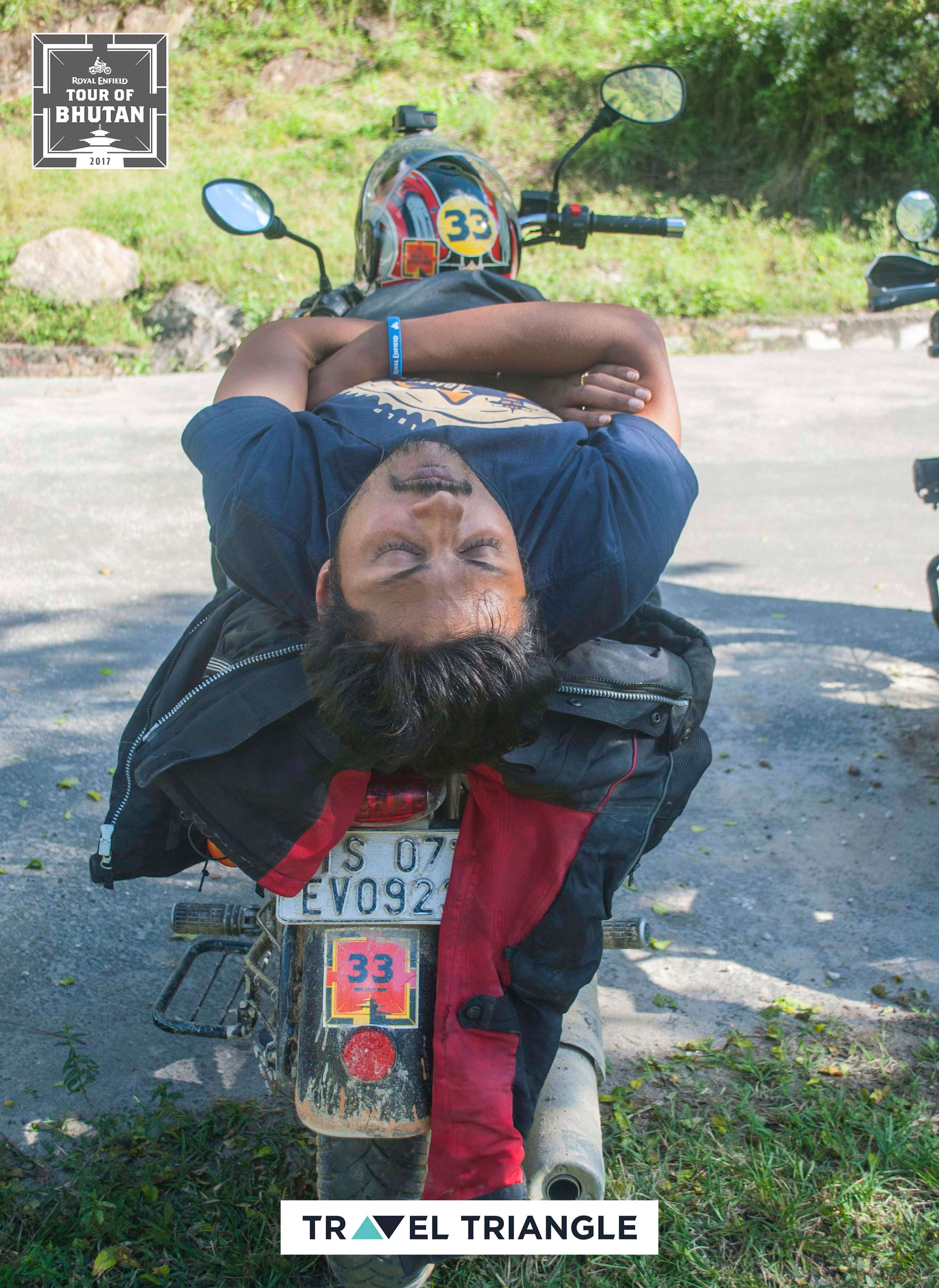 Mongar to Trashigang: a rider resting on his bike