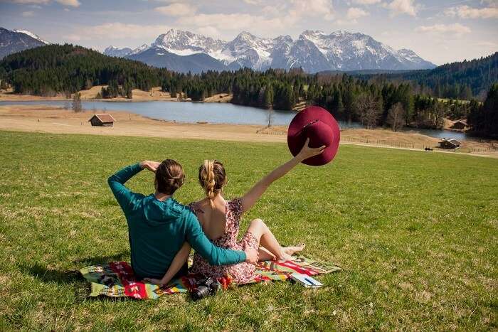 a couple enjoying a picnic on their honeymoon in Germany