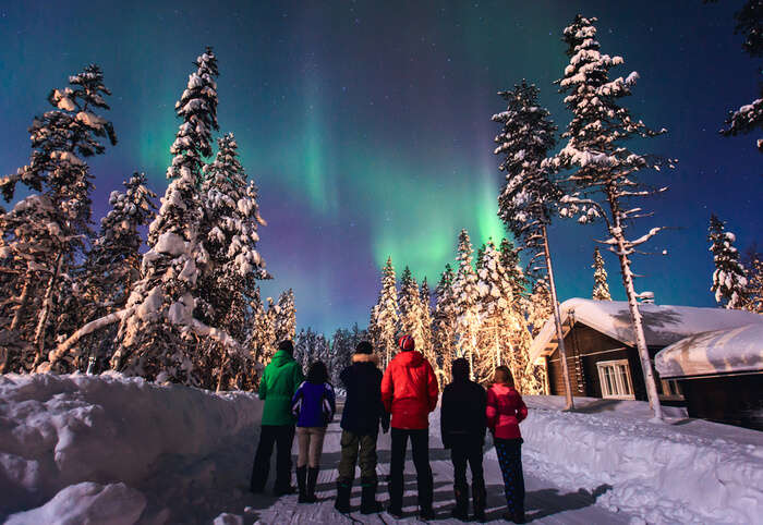 People watching the Northern Lights in Lapland