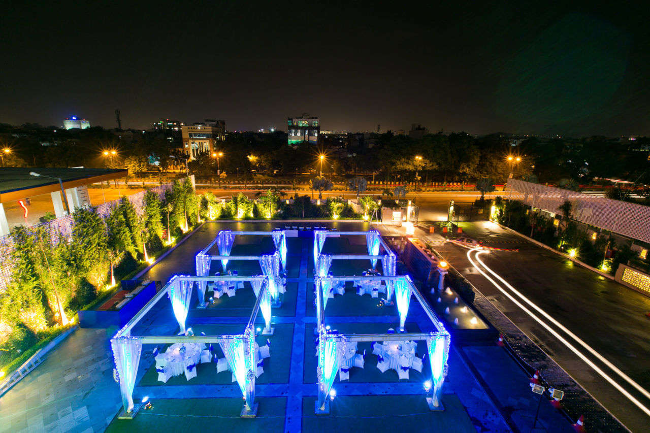 beautifully lit terrace sitting area of Lalit in Jaipur