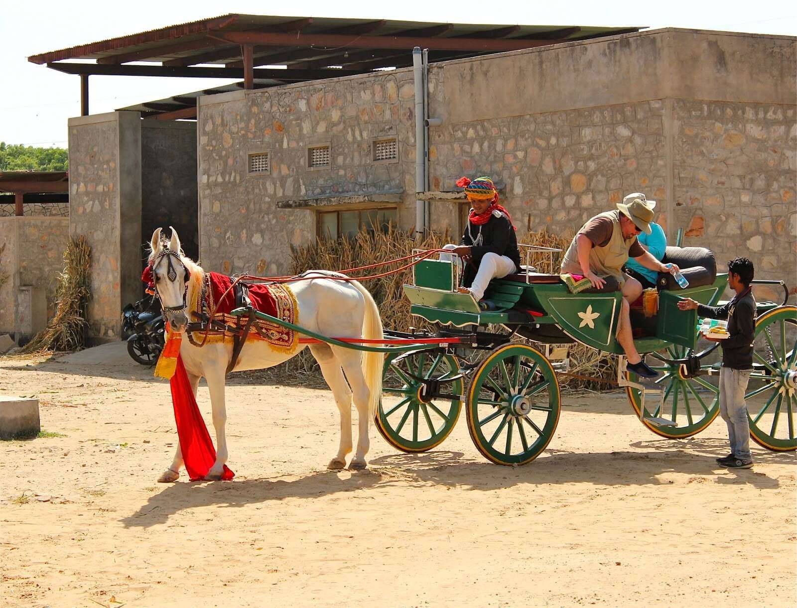 people sitting in a tonga ride