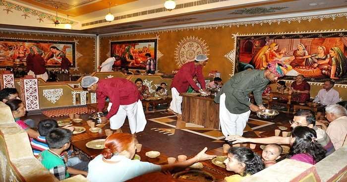 Rajasthani hosts serving for food to guests
