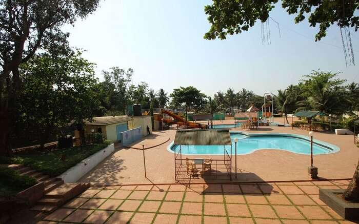 A pool view of Krishna Resort and Waterpark in Mumbai