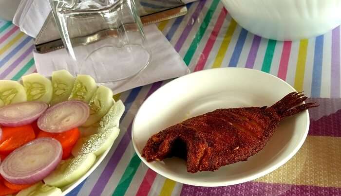 fish cooked by chef on houseboat