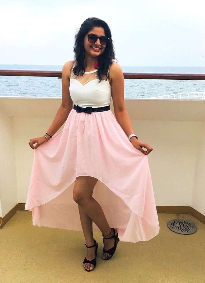 saurabhi singapore family trip: saurabhi posing in dress in cruise