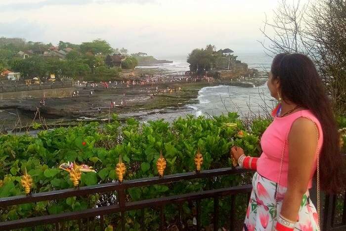 pankaj honeymoon trip to bali: looking at temple in tanah lot