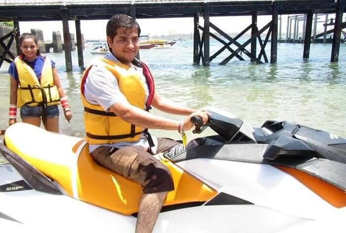 pankaj honeymoon trip to bali: pankaj posing on a jetski