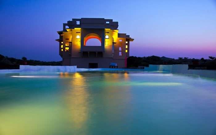 Lakshman Sagar Resort lit up in evening 