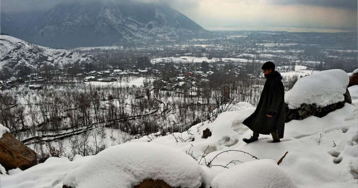 Local kid post snowfall in Kashmir