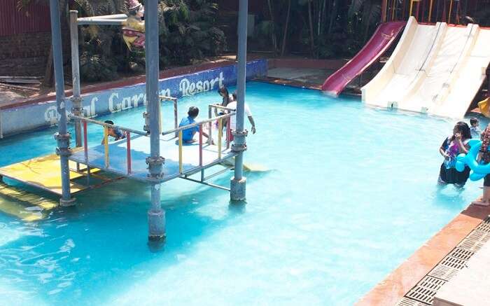 People playing in the waterpark of Royal Garden Resort in Mumbai