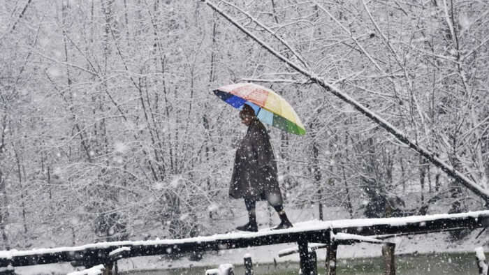 Local during snowfall in Kashmir