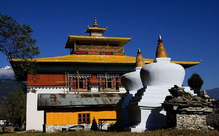 The gompas of Tashiding Monastery overlooking mountains in Sikkim 