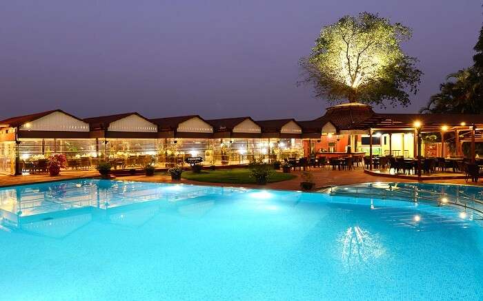 The well-lit property of The Dukes Retreat by the pool in Khandala 