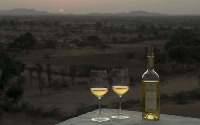 Wine glasses and bottle in Lakshman Sagar Resort