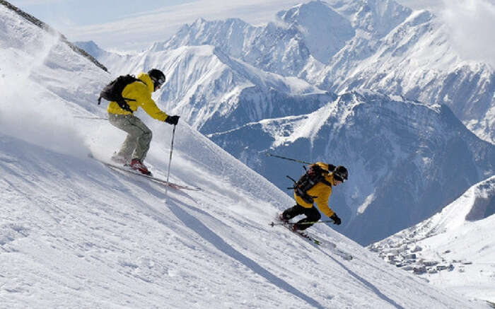 Skiing in Auli's snow filled hill station, an adventure destination