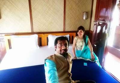 Couple inside a houseboat in Alleppey