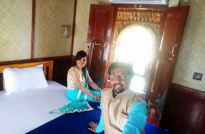 Couple inside a houseboat in Alleppey