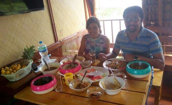 Couple enjoying lunch on a houseboat