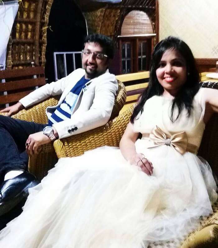 Couple traveling in a houseboat in Alleppey