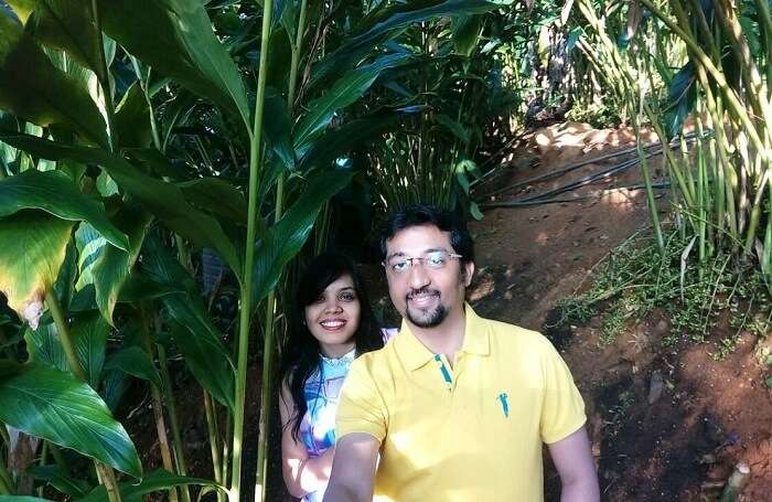 Couple exploring hidden garden in Munnar