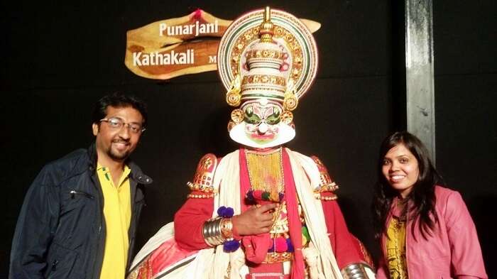 couple with Kathakali dancers