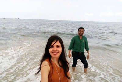 couple at a beach in Kerala