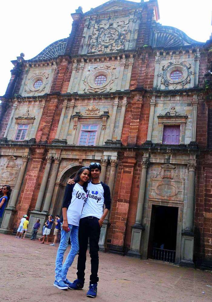 Couple visits a church in Goa
