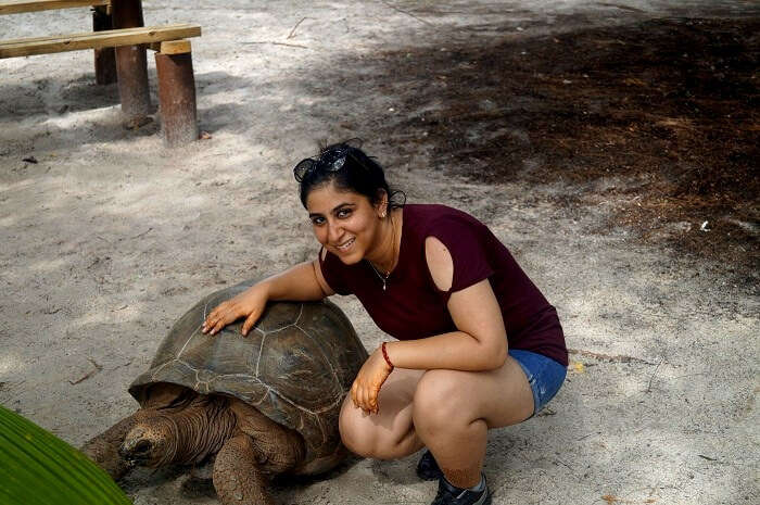 Keshavs wife with a tortoise in Praslin