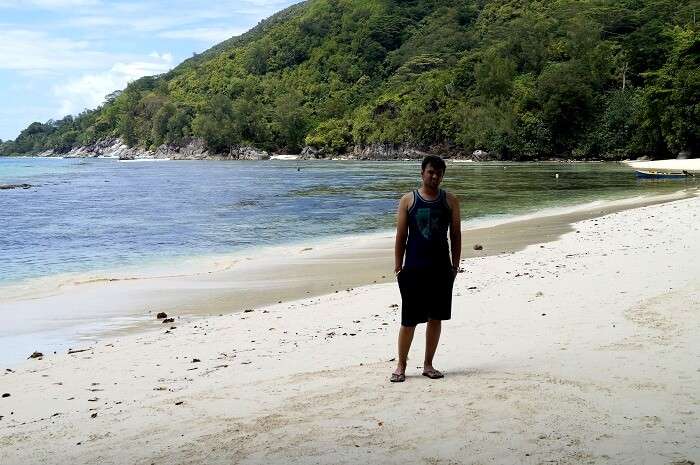 Keshav on a beach in Seychelles