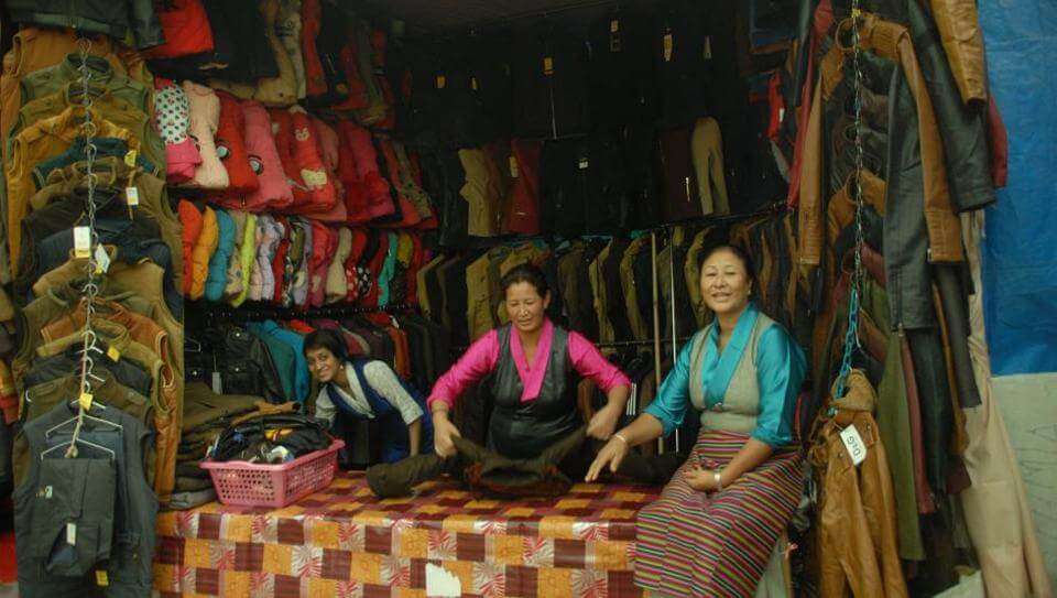 two women selling woolen clothes