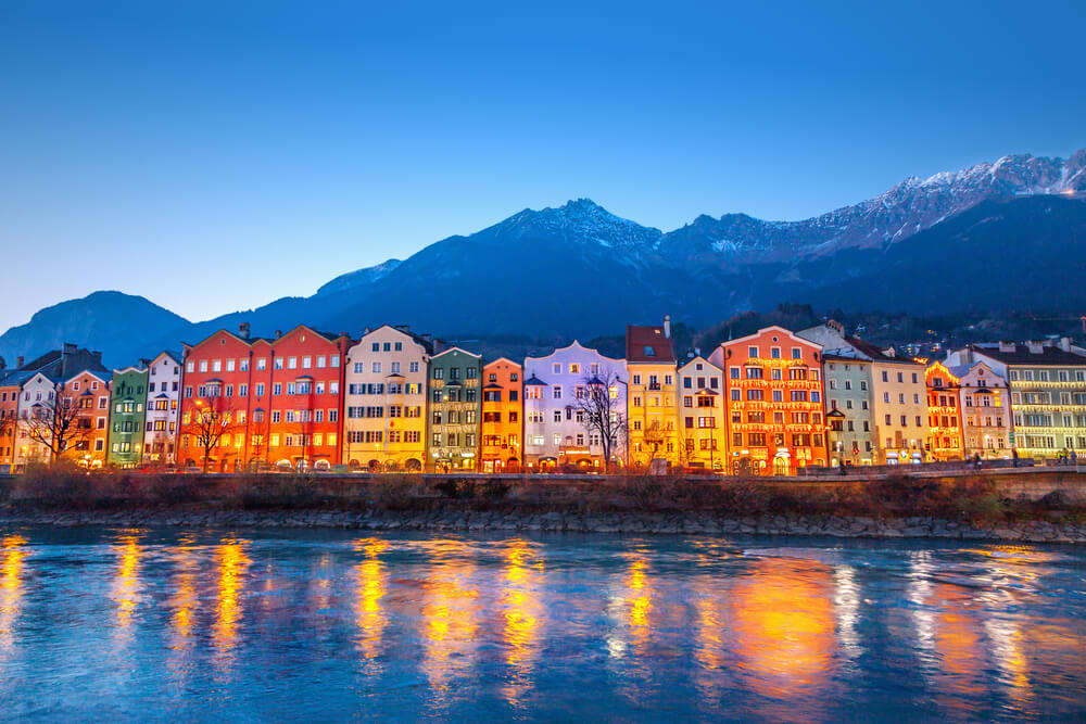 Colourful homes by water in Innsbruck