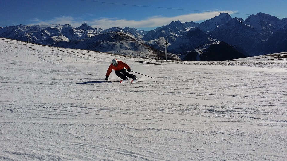 skiing in mountains