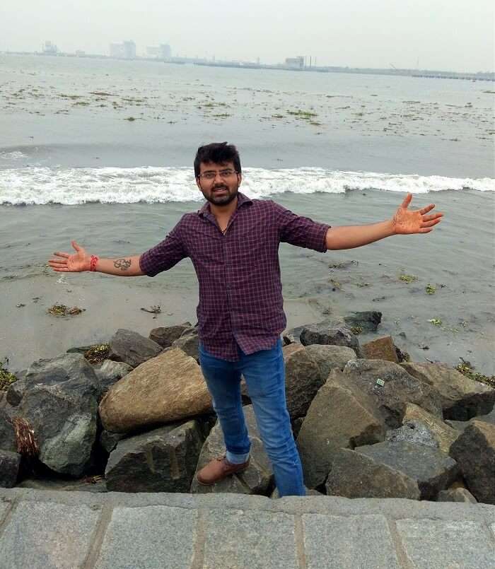 Traveler on a beach in Alleppey