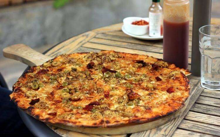Pizza on table in Glens Bakehouse