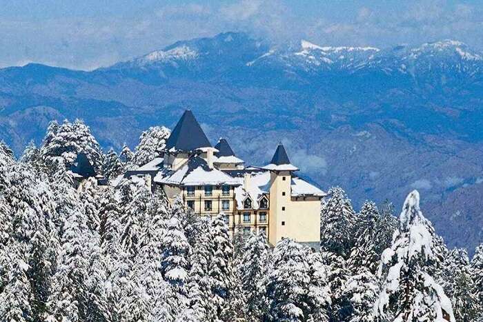 Snow covered cecil hotel in shimla