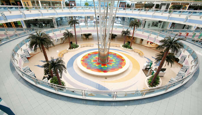 Go shopping at The Galleria, Al Raha, and Marina Mall