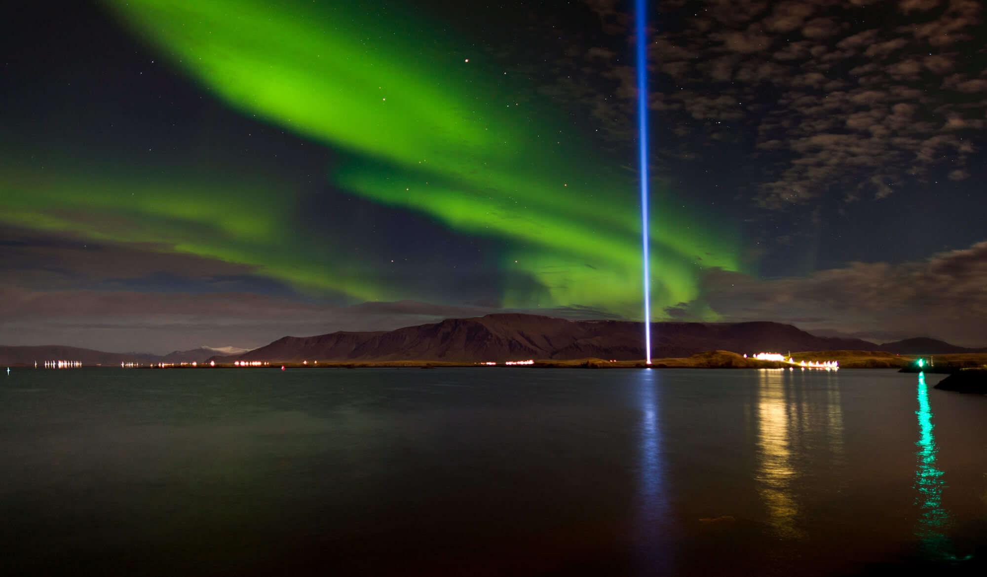 Imagine Peace Tower during northern lights
