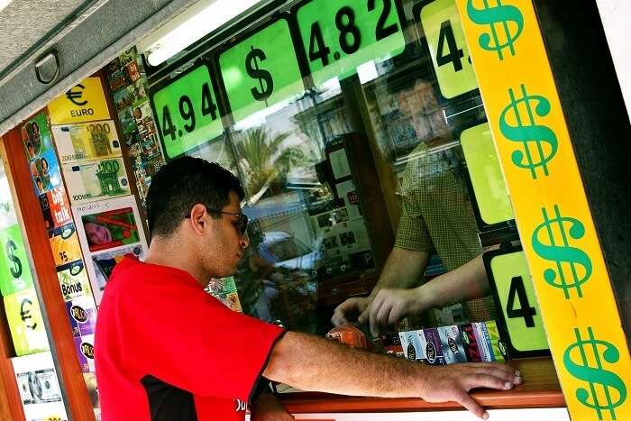 Exchange foreign currency at a local market