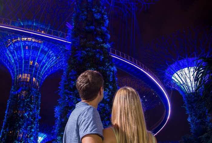 couple watching the light and sound show in singapore