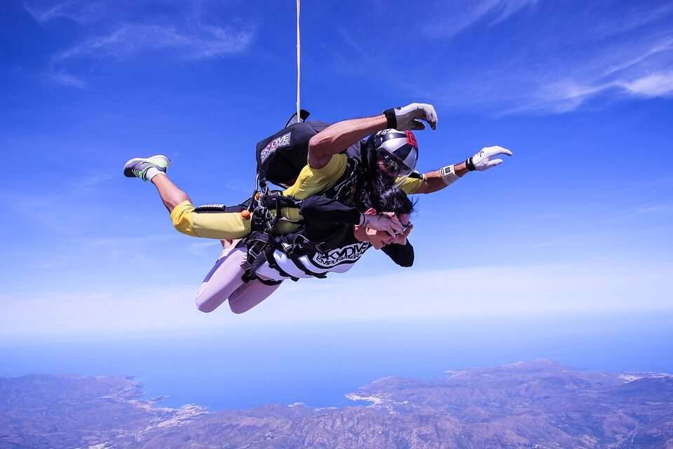 two men tandem skydiving