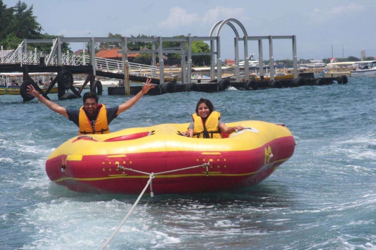 tushar honeymoon trip to Bali: tushar & wife enjoying tube ride