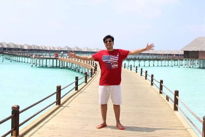 ankit wadhwa maldives honeymoon: posing near water villas