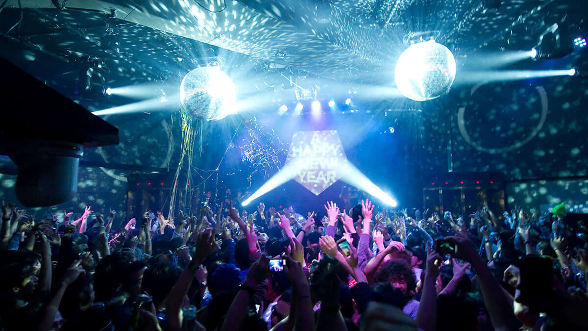 a nightclub lit with blue lights