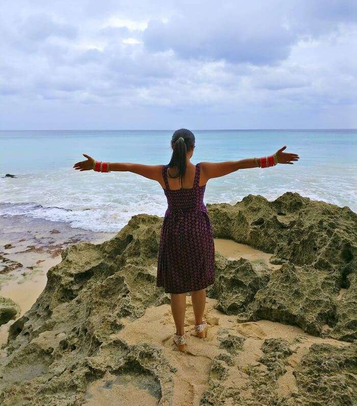 Female traveler on a beach