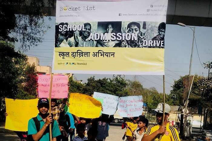 Organisers and students rallying during the school admission drive
