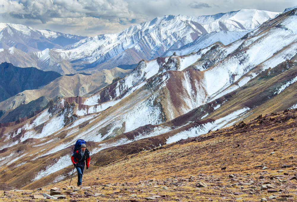 a man hiking in mountains