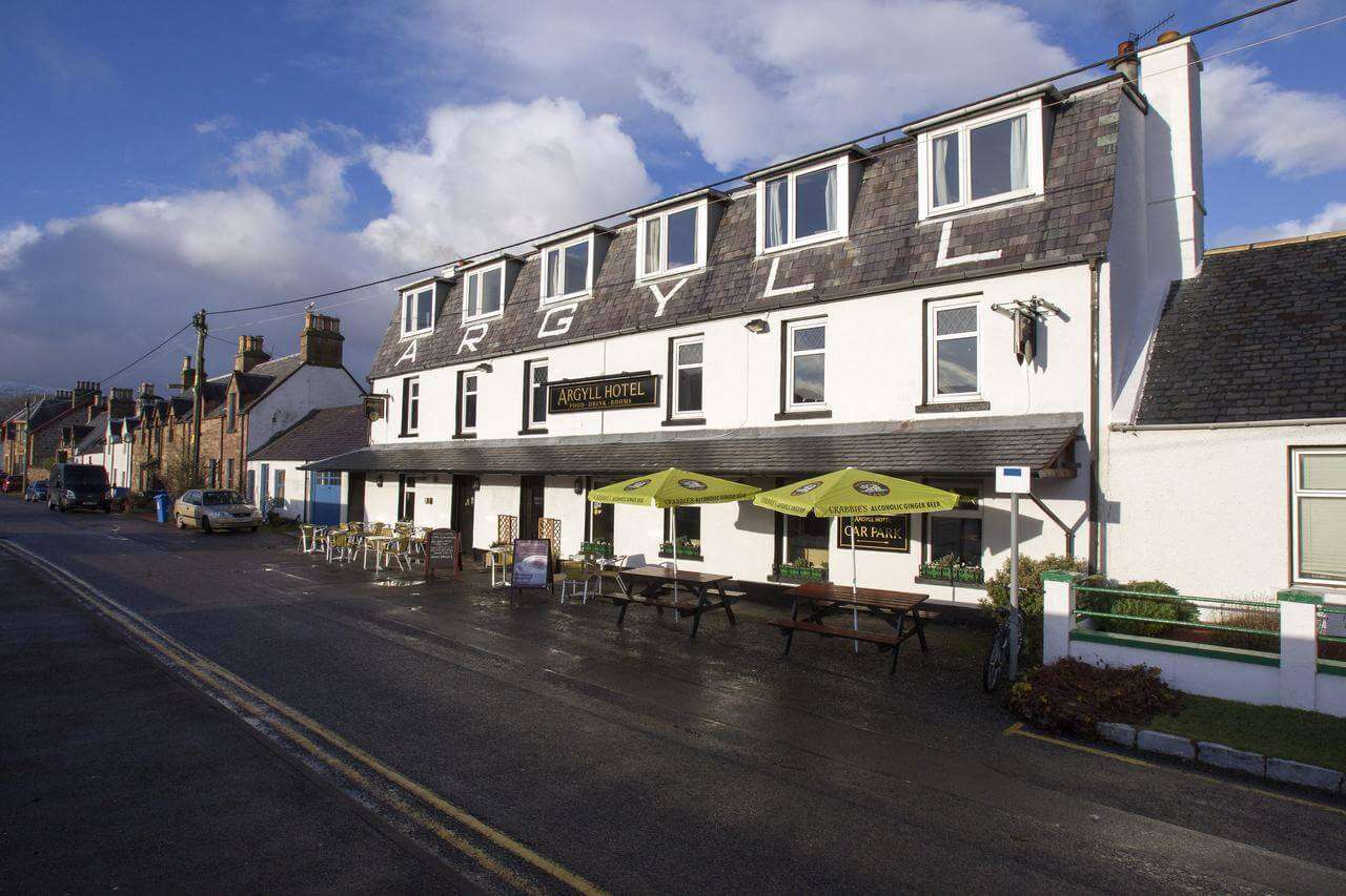 grey and white painted building of Argyll Hotel