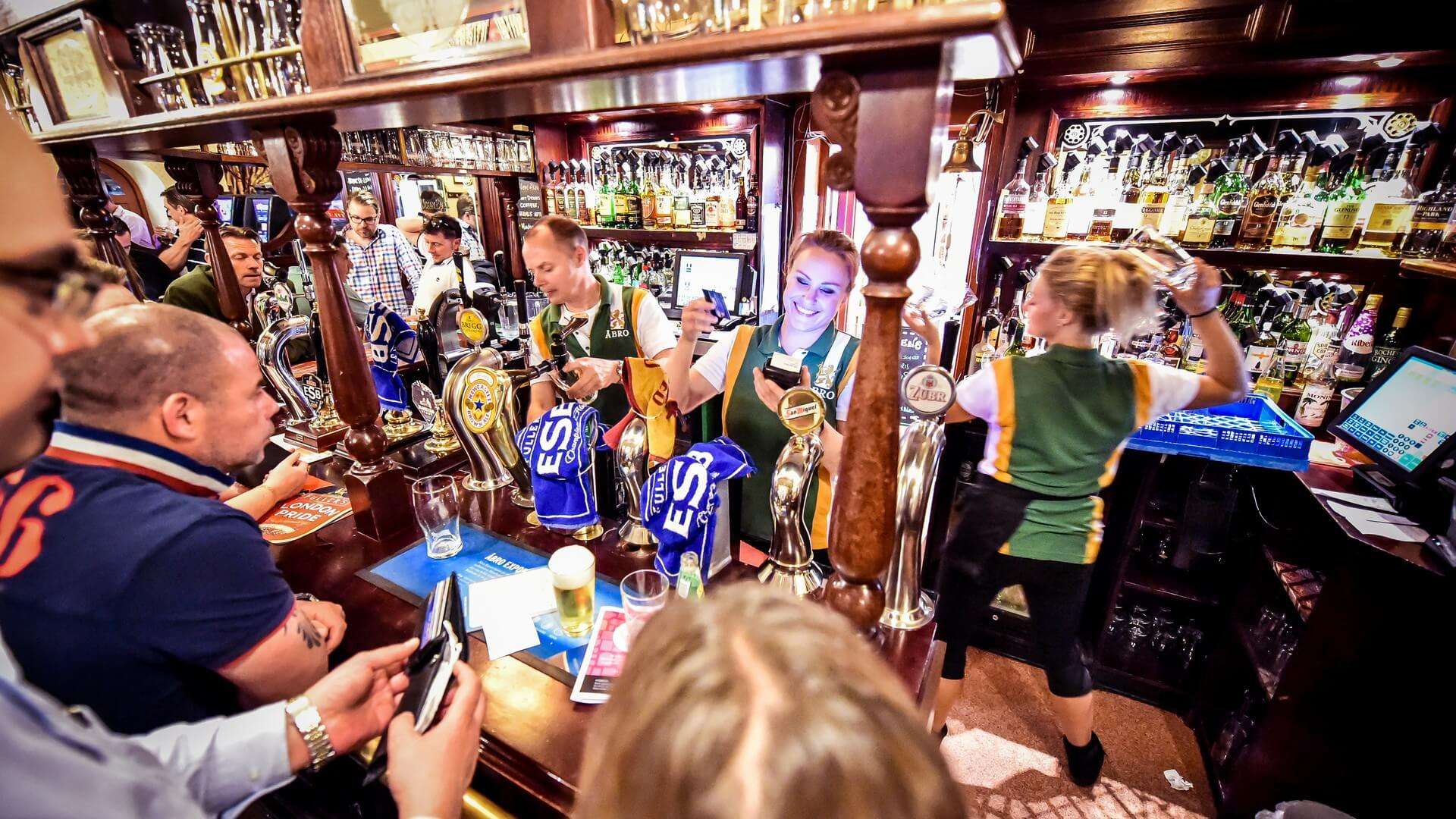 people enjoying at a bar